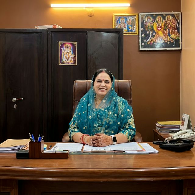 Principal at her desk